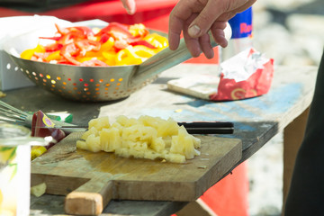 red and yellow bulgarian pepper pieces in a plate ready for cooking