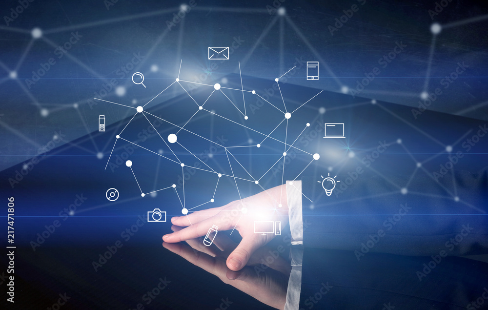 Poster Male hands touching interactive table with blue mixed communication icons in the background