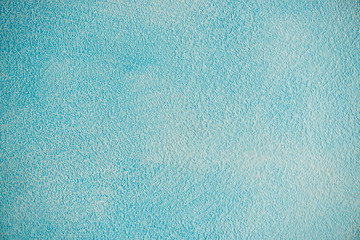 Obraz premium New blue cement wall Beautiful concrete stucco. painted cement Surface design banners.Gradient,consisting,paper design,book,abstract shape Website work,stripes,tiles,background texture wall.