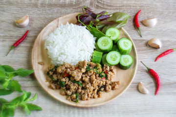 Fototapeta na wymiar Thai spicy food, Fried pork with sweet basil