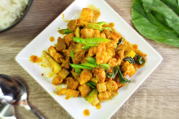 fried red curry paste with pork and chinese kale