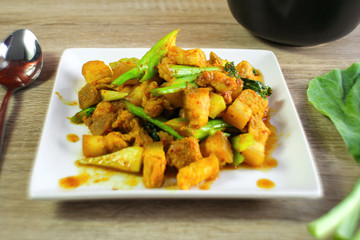 fried red curry paste with pork and chinese kale