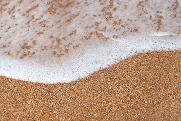 The texture of the sandy sea shore. The view from the top.