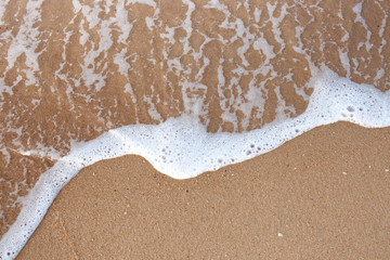 The texture of the sandy sea shore. The view from the top.