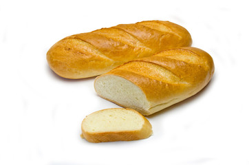 loaves of bread and a piece next to
