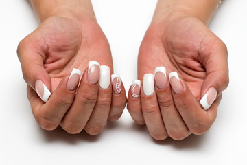 wedding classic French white manicure with sparkles and white drawings on long square nails
