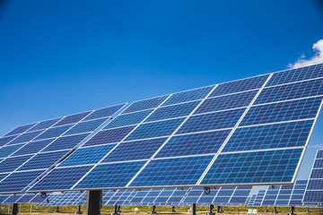 Group of solar panels on a blue sky
