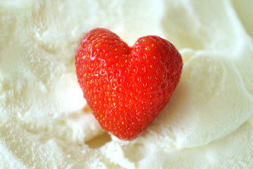 A Strawberry in ice cream.