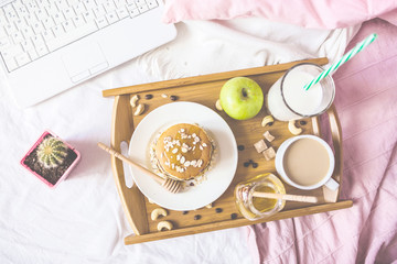 healthy breakfast in bed Coffee Milk Honey Pancake Copy space