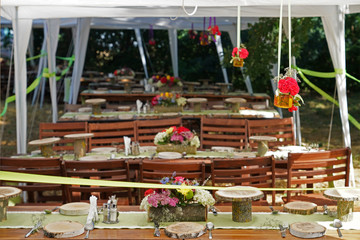 Tables are served for picnic in the summer