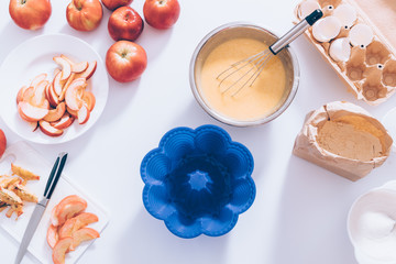 Ingredients and tools for cooking apple pie