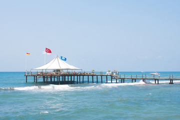 Fototapeta premium Wooden pier on the sea to the beach in Turkey