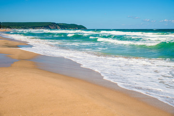 Sandy beach and blue ocean