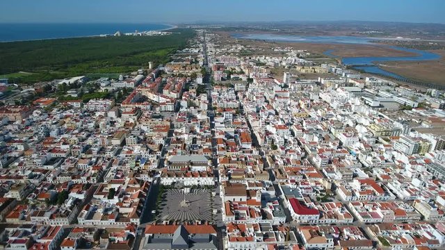 Aerial. View from the sky of the village of Vili Real Santo Antonio and the Guadiana River.