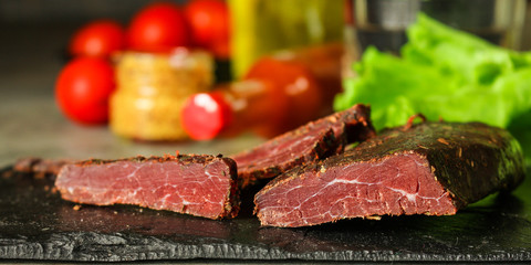 salami cheese-dried smoked sliced ​​slices (sausages) . food background