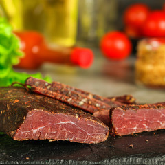salami cheese-dried smoked sliced ​​slices (sausages) . food background