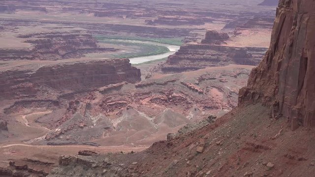 Mountain landscape of red erosion rocks and salt lake in Canyonlands National Park, Utha