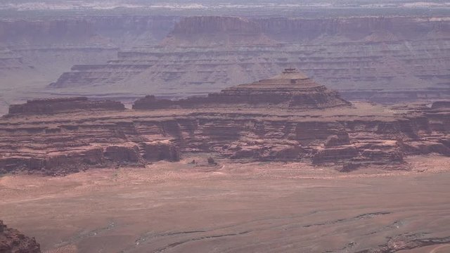 Mountain landscape of red erosion rocks and salt lake in Canyonlands National Park, Utha