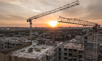 Aerial view of construction site at sunset