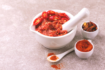 Traditional Maghrebi hot chili pepper sauce paste harissa. adjika