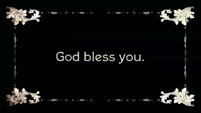 A re-created film frame from the silent movies era, showing an intertitle text: God bless you.
