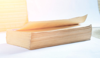Old book on white background, self-growth, reading books, blank for text placement, mind