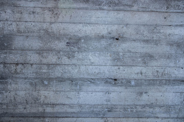 concrete wall of blue color with horizontal lines. texture.
