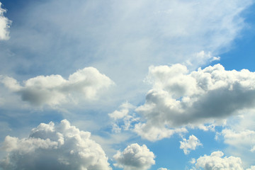 Beautiful blue sky and white cumulus and cirrus clouds. Background. 