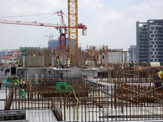 High rise apartment construction using the precast system aluminium form work. The form work is...
