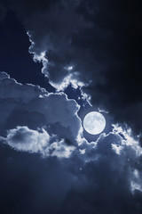 Dramatic Nighttime Clouds and Sky With Beautiful Full Blue Moon