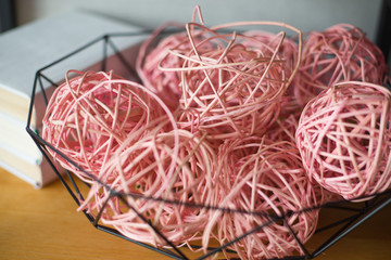 decorative balls of pink threads and glue