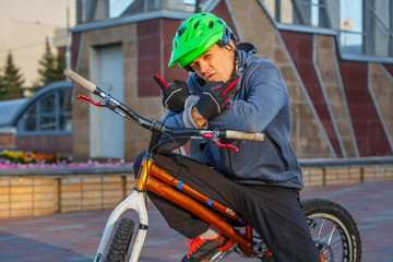 professional BMX rider made tricks on bicycle 