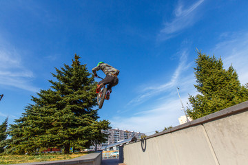 professional BMX rider made tricks on bicycle 