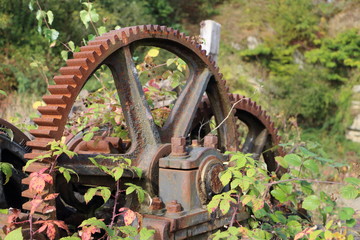Old mechanical rusty gear in Belgium Ardennes