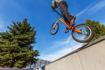 professional BMX rider made tricks on bicycle 