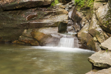 Waterfall Cutting Through Bedrock Of Mountain Side In Pennsylvania