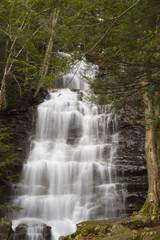 Fototapeta na wymiar Large Stepped Waterfall Flowing Down Pennsylvania Mountain Side