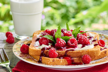 Sunmmer outdoor breakfast with toast and milk