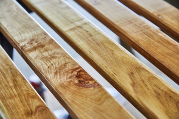 Paint Brush in a can of varnish in preparation to stain the wood slats