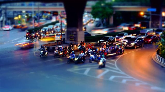 4K Time lapse transportation vehicle waiting gree light at junction - Miniature effect