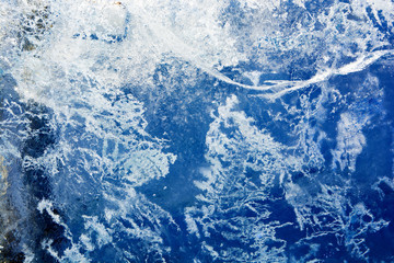 The texture of the ice. The frozen water.Winter background    