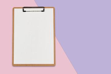 Clipboard with white sheet on pastel color background, Minimal concept