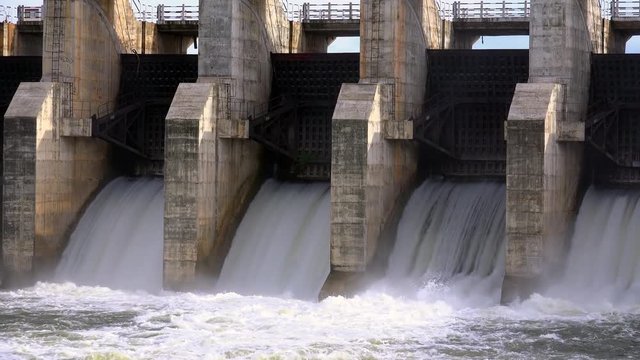 Beautiful view of Meheragala reservoir dam illuminated by sun. Impressive water barrier construction represented on Sri Lankan 5000 rupee banknote. Camera stay still, Yala National Park, Sri Lanka.