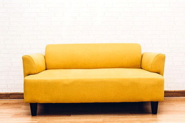 Interior sofa furniture decoration on white brick wall background