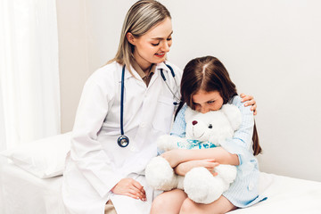 Doctor consulting and consulting with little girl in hospital.A little girl has sick.healthcare and medicine