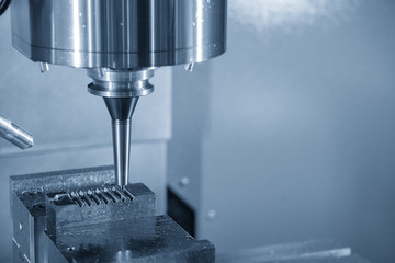 The CNC milling machine cutting the injection mold part with the solid ball endmill tool.The...