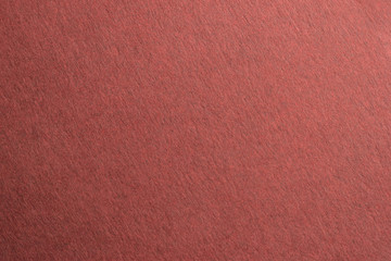 Abstract texture of red paper background and empty space for text .