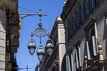 Fototapeta na wymiar Ancient lantern on the streets of Barcelona