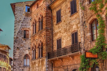 Fototapeta na wymiar The facades of houses from San Gimignano, Italy