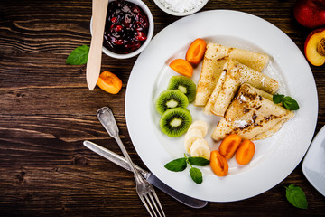 Crepes with fruits and creme 